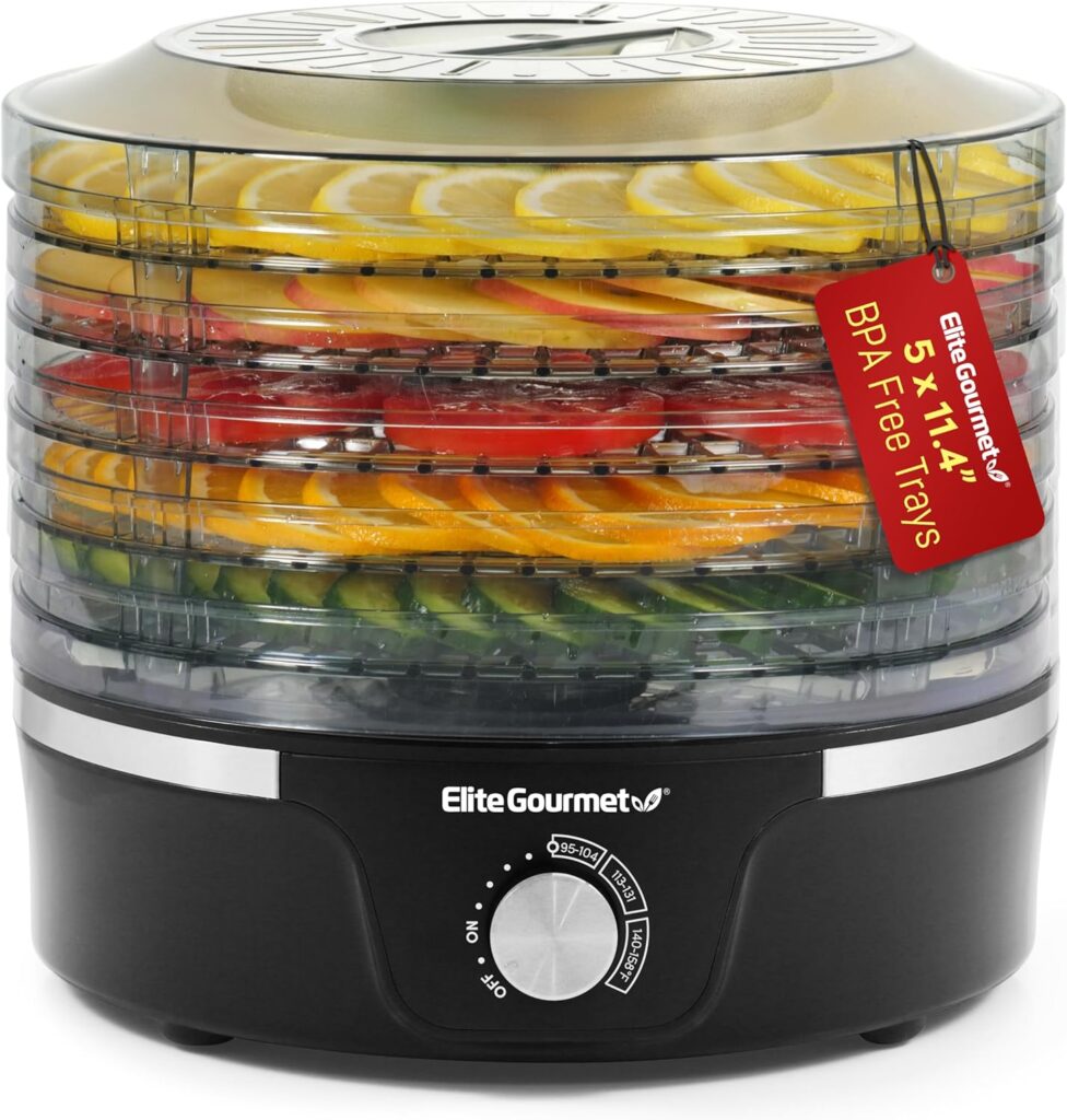 Elite Gourmet EFD319 food dehydrator with multiple trays drying fruit